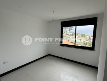 Небольшая квартира 1+1 на 3-м этаже в новой резиденции в центре престижного района Кестель.-id-4623-фото-3