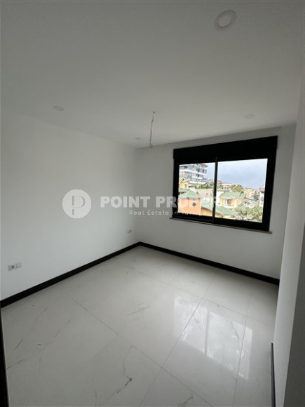 Небольшая квартира 1+1 на 3-м этаже в новой резиденции в центре престижного района Кестель.-id-4623-фото-3