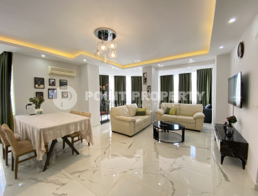 Three-room apartment for rent in a residence with a swimming pool in Mahmutlar, Alanya.-id-4625-photo-1