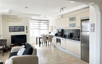 Equipped three-room apartment 115 m2 with two balconies and furniture, Mahmutlar district-id-4629-photo-2