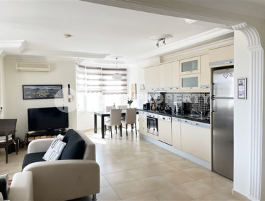 Equipped three-room apartment 115 m2 with two balconies and furniture, Mahmutlar district-id-4629-photo-2