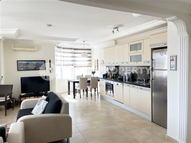 Equipped three-room apartment 115 m2 with two balconies and furniture, Mahmutlar district-id-4629-photo-2