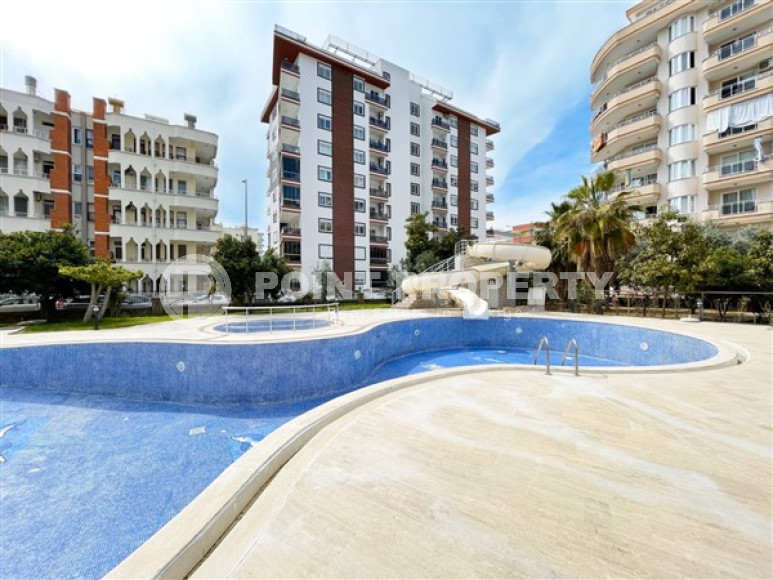 Equipped three-room apartment 115 m2 with two balconies and furniture, Mahmutlar district-id-4629-photo-11