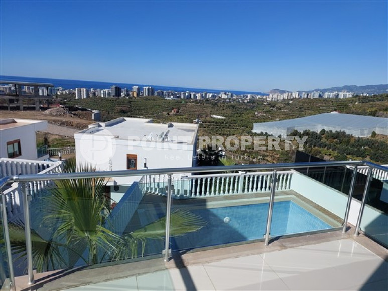 Атмосферная двухэтажная вилла с площадью 200 м2 в районе Каргыджак-id-4632-фото-14