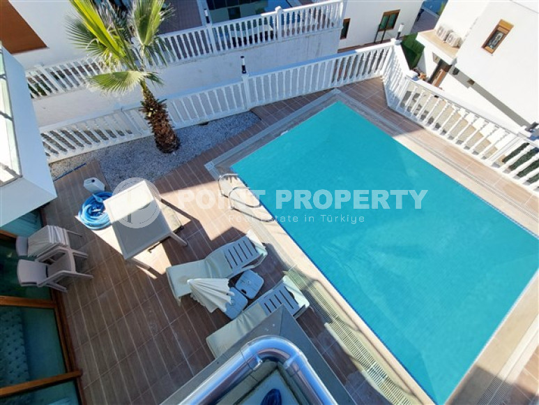 Атмосферная двухэтажная вилла с площадью 200 м2 в районе Каргыджак-id-4632-фото-16