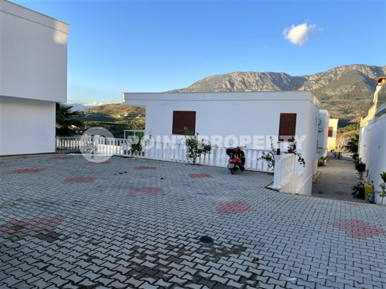 Атмосферная двухэтажная вилла с площадью 200 м2 в районе Каргыджак-id-4632-фото-18