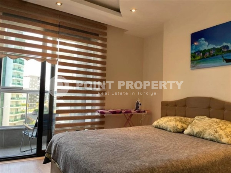 Modern apartment on the 5th floor in a residence built in 2020 in the center of Mahmutlar.-id-4640-photo-5