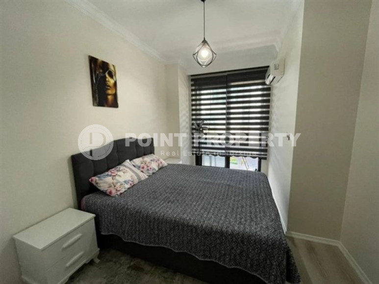 Modern apartment on the 5th floor in a residence built in 2020 in the center of Mahmutlar.-id-4640-photo-6