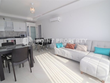 Spacious, bright apartment with modern design 350 meters from the beach in the center of Mahmutlar.-id-4642-photo-1