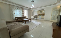 Large three bedroom apartment on the 2nd floor in the center of Mahmutlar.-id-4644-photo-1