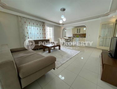 Large three bedroom apartment on the 2nd floor in the center of Mahmutlar.-id-4644-photo-1