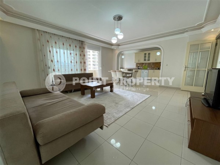 Large three bedroom apartment on the 2nd floor in the center of Mahmutlar.-id-4644-photo-1
