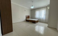 Large three bedroom apartment on the 2nd floor in the center of Mahmutlar.-id-4644-photo-4