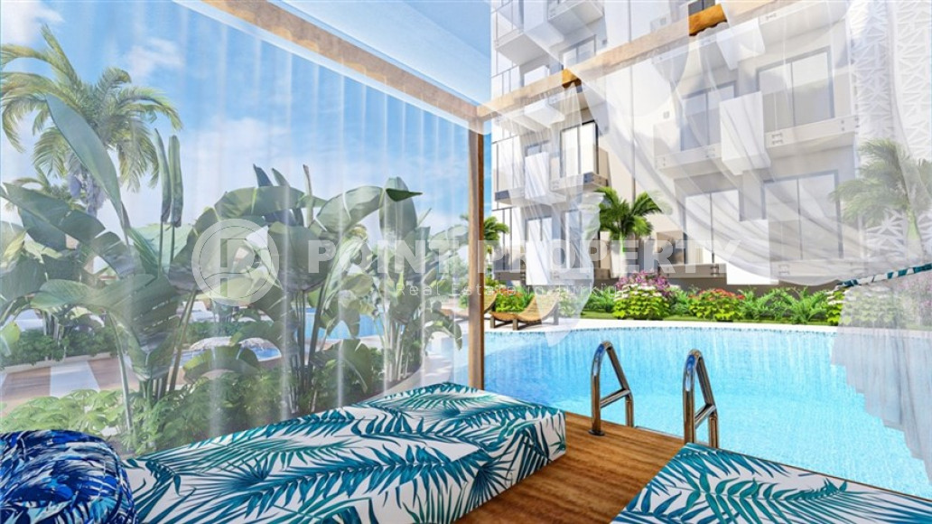 Apartment 2+1 in a new residence with a completion date of 12/30/2023. The central part of Alanya.-id-4656-photo-9