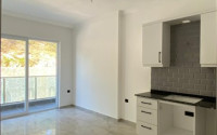 Compact 1+1 apartment on the 1st floor in a new residence, commissioned in 2023.-id-4658-photo-1