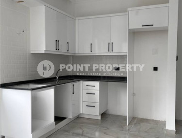 Апартаменты 1+1 с чистовой отделкой в новом жилом комплексе в районе Авсаллар.-id-4661-фото-2