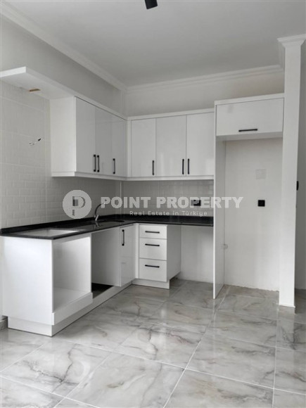 Апартаменты 1+1 с чистовой отделкой в новом жилом комплексе в районе Авсаллар.-id-4661-фото-2