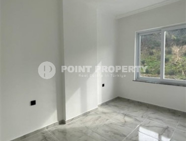 Апартаменты 1+1 с чистовой отделкой в новом жилом комплексе в районе Авсаллар.-id-4661-фото-3