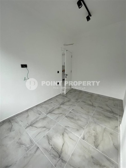 Апартаменты 1+1 с чистовой отделкой в новом жилом комплексе в районе Авсаллар.-id-4661-фото-4