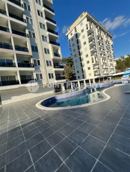 Апартаменты 1+1 с чистовой отделкой в новом жилом комплексе в районе Авсаллар.-id-4661-фото-9