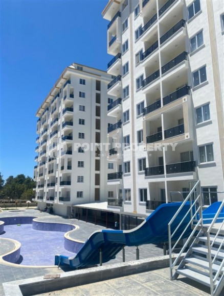 Апартаменты 1+1 с чистовой отделкой в новом жилом комплексе в районе Авсаллар.-id-4661-фото-10