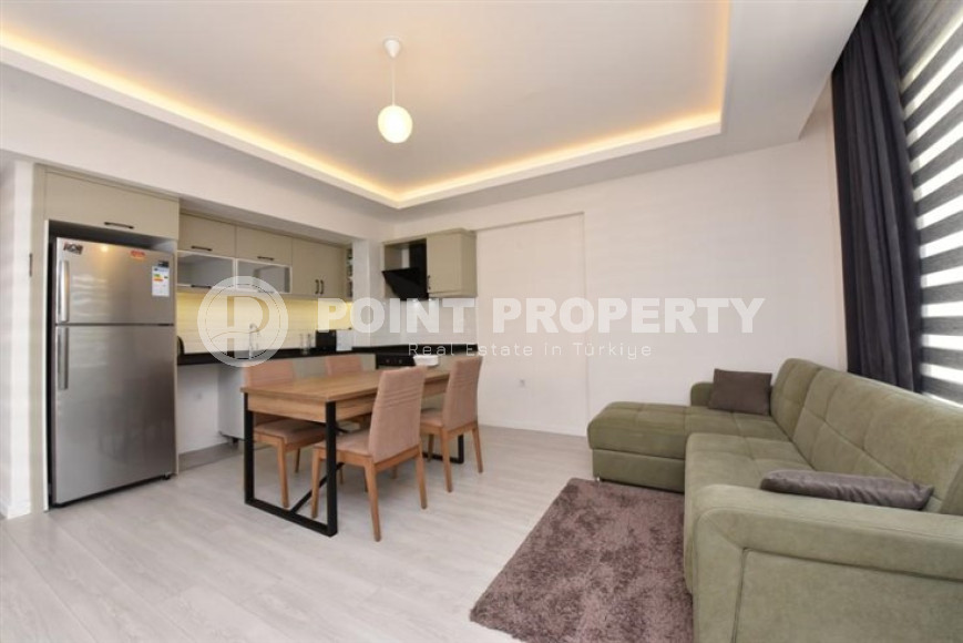 Modern furnished 1+1 apartment 500 meters from the beach in the center of Alanya.-id-4662-photo-2