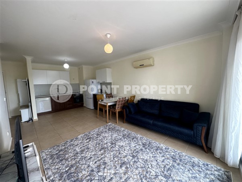 Spacious one bedroom apartment 650 meters from the beach and promenade in the center of Mahmutlar.-id-4664-photo-2