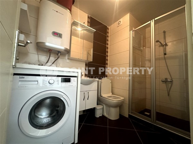 Spacious one bedroom apartment 650 meters from the beach and promenade in the center of Mahmutlar.-id-4664-photo-6