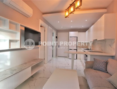 Новая квартира с мебелью и бытовой техникой в центре Аланьи и в 200 метрах от пляжа и набережной.-id-4666-фото-1