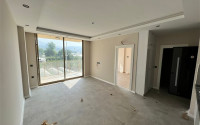 Apartment 1+1 on the ground floor of the complex at the stage of finishing work, Kargicak district-id-4671-photo-3