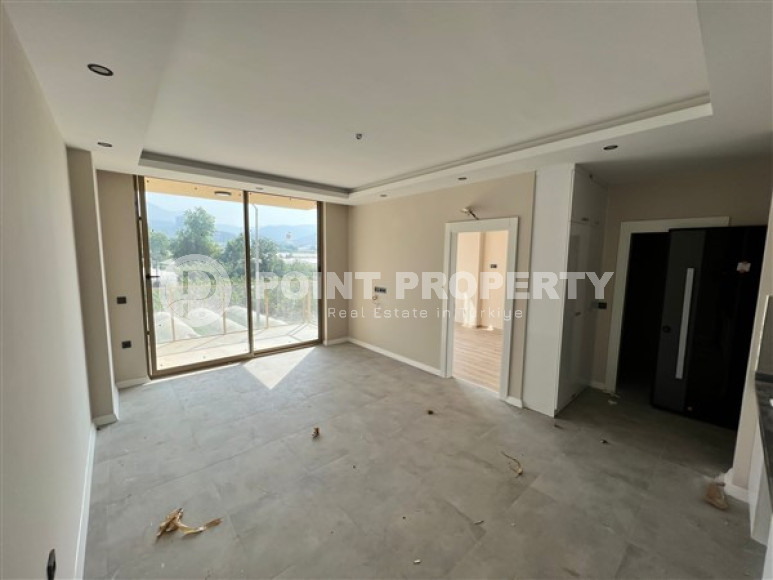 Apartment 1+1 on the ground floor of the complex at the stage of finishing work, Kargicak district-id-4671-photo-3