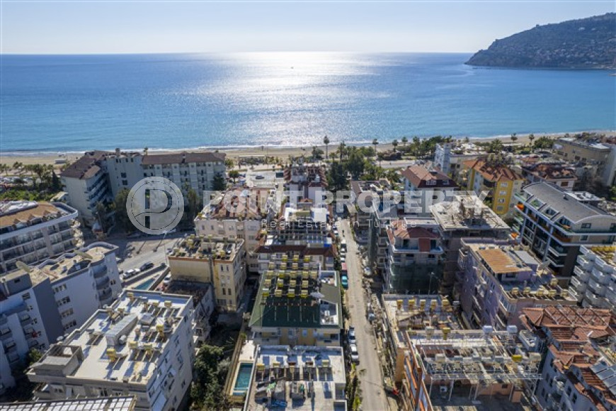 Светлая двухуровневая квартира с потрясающей локацией в 200 метрах от моря, центр Аланьи-id-4674-фото-17