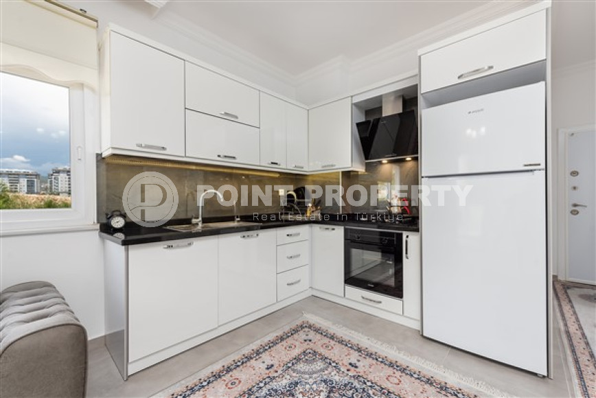 Современная светлая квартира 1+1, общей площадью 55 м2, в километре от моря.-id-4677-фото-3