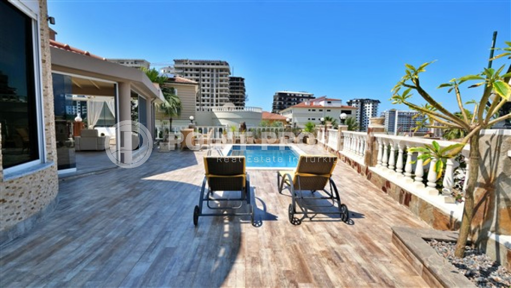 Роскошная вилла 3+1 с бассейном и садом в 750 метрах от пляжа и набережной.-id-4681-фото-18