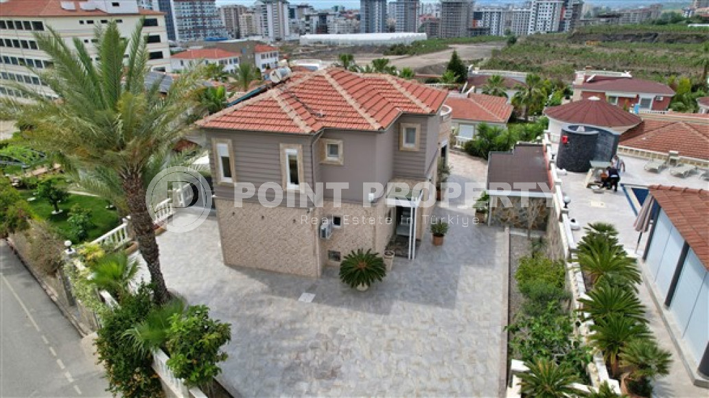 Роскошная вилла 3+1 с бассейном и садом в 750 метрах от пляжа и набережной.-id-4681-фото-22