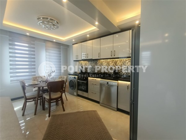 Стильная двухуровневая квартира 3+2 на 5-м этаже с мансардой в 300 метрах от моря.-id-4683-фото-2