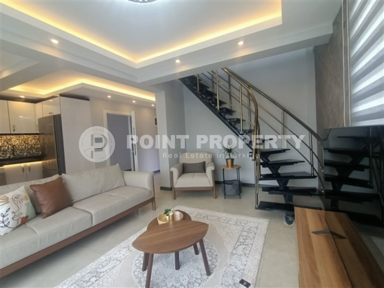 Стильная двухуровневая квартира 3+2 на 5-м этаже с мансардой в 300 метрах от моря.-id-4683-фото-4