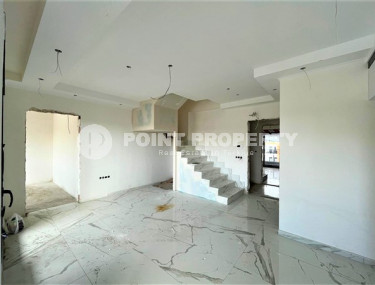 Двухуровневая квартира с тремя спальнями на этапе строительства, в центре Алании, 300м до моря-id-1695-фото-4