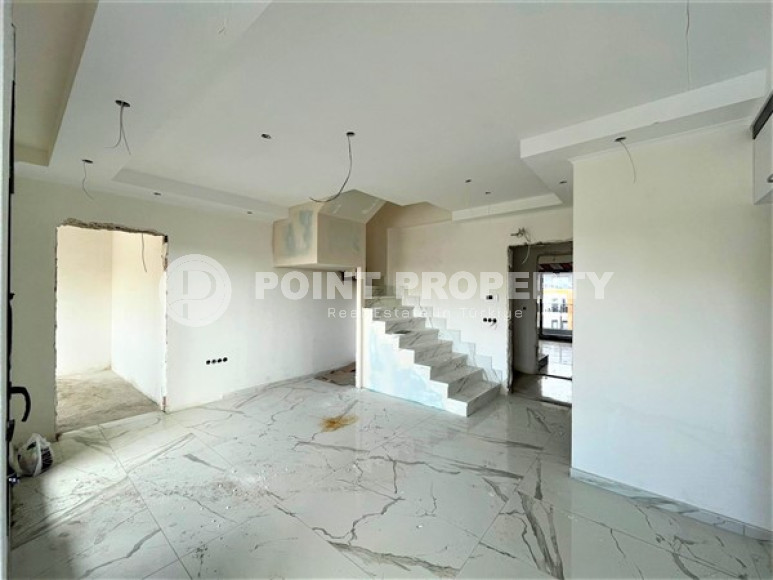 Двухуровневая квартира с тремя спальнями на этапе строительства, в центре Алании, 300м до моря-id-1695-фото-4