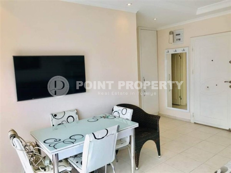 Modern, bright apartment on the 7th floor with panoramic views of the city, sea and Taurus Mountains.-id-4697-photo-3