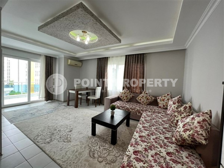 Comfortable furnished 1+1 apartment 500 meters from the sea in the center of Mahmutlar.-id-4698-photo-2