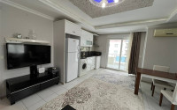 Comfortable furnished 1+1 apartment 500 meters from the sea in the center of Mahmutlar.-id-4698-photo-3