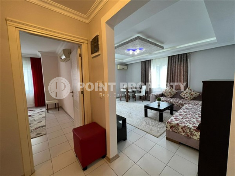 Comfortable furnished 1+1 apartment 500 meters from the sea in the center of Mahmutlar.-id-4698-photo-6