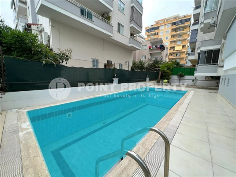 Comfortable furnished 1+1 apartment 500 meters from the sea in the center of Mahmutlar.-id-4698-photo-11