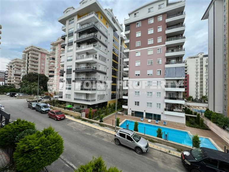 Comfortable furnished 1+1 apartment 500 meters from the sea in the center of Mahmutlar.-id-4698-photo-13