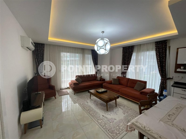 Furnished apartment 1+1 with an area of 75 m2 500 meters from the beaches of Mahmutlar-id-4699-photo-2