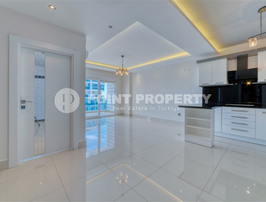 Просторная светлая квартира 3+1 с чистовой отделкой в 250 метрах от пляжа в престижном спокойном районе Аланьи - Тосмур.-id-4700-фото-2