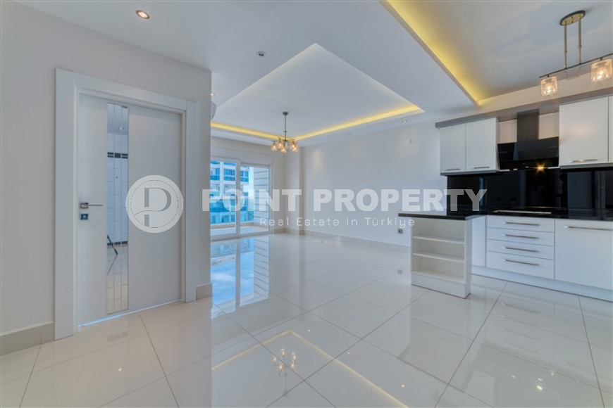 Просторная светлая квартира 3+1 с чистовой отделкой в 250 метрах от пляжа в престижном спокойном районе Аланьи - Тосмур.-id-4700-фото-2