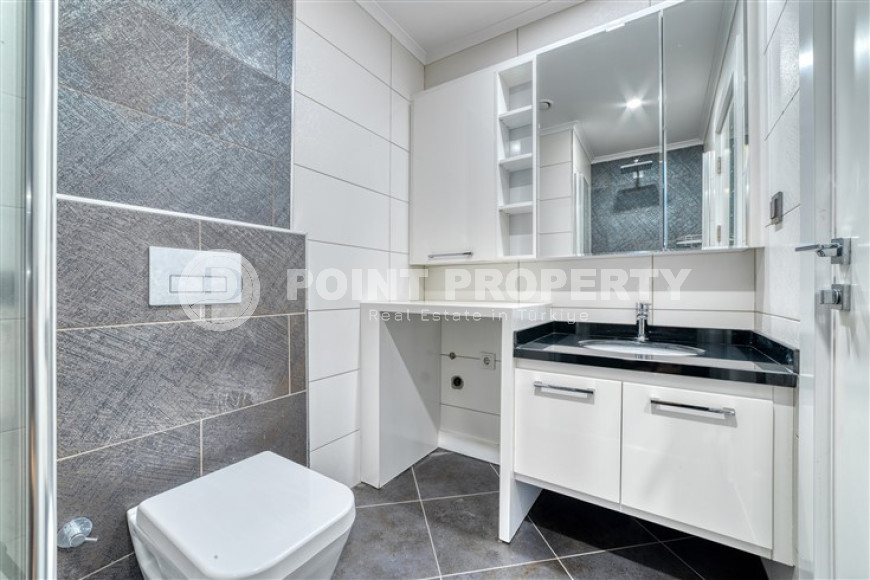 Просторная светлая квартира 3+1 с чистовой отделкой в 250 метрах от пляжа в престижном спокойном районе Аланьи - Тосмур.-id-4700-фото-11