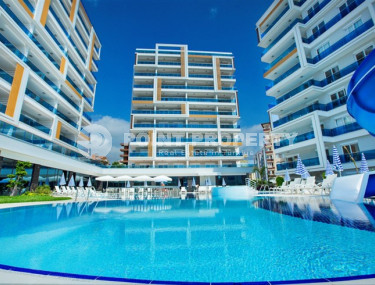 Просторная светлая квартира 3+1 с чистовой отделкой в 250 метрах от пляжа в престижном спокойном районе Аланьи - Тосмур.-id-4700-фото-1